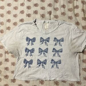 Altar'd State Blue and White Cropped Tee with Bow Pattern